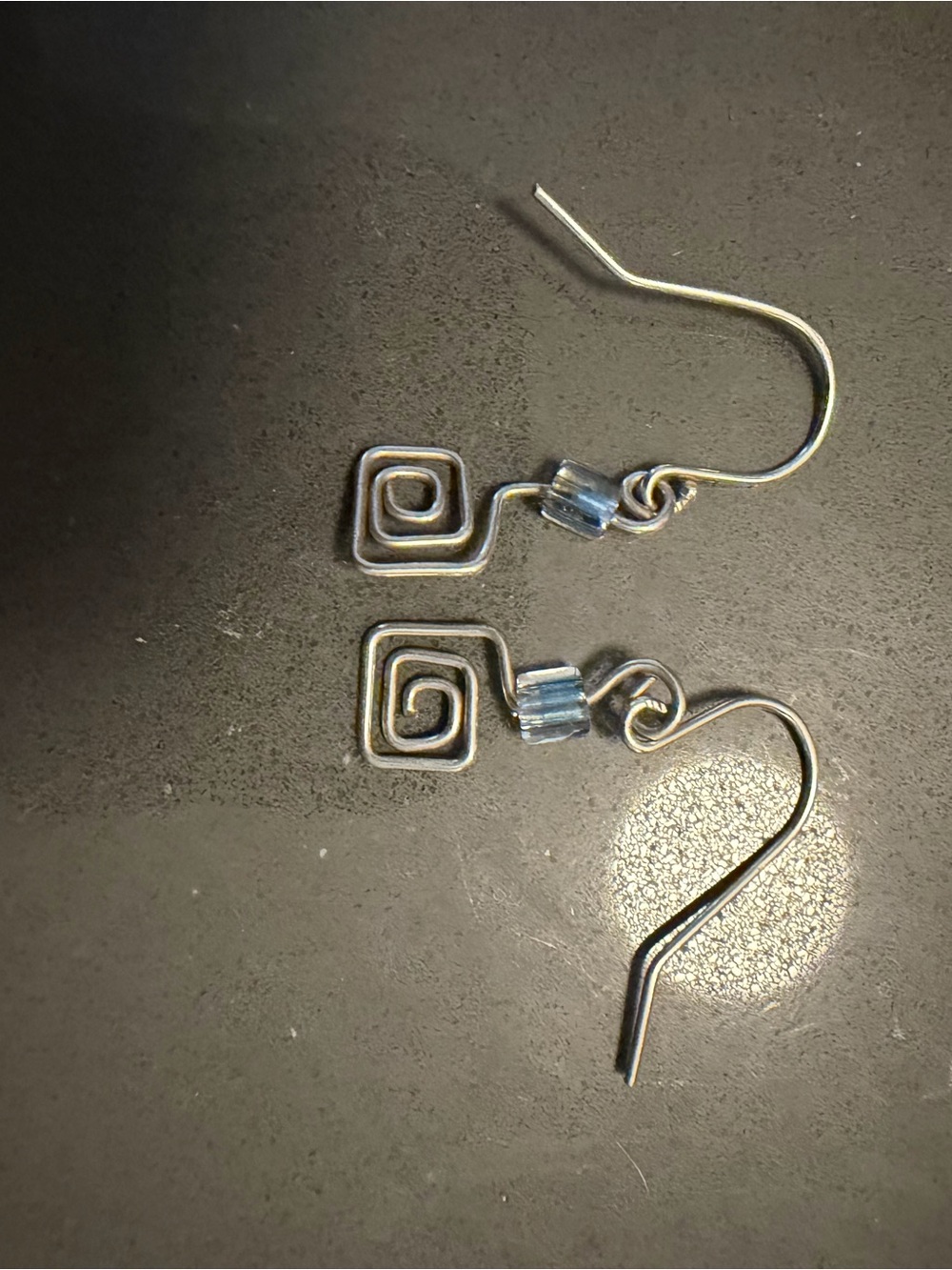 Sterling Silver Spiral Drop Earrings with Blue Accent Bead